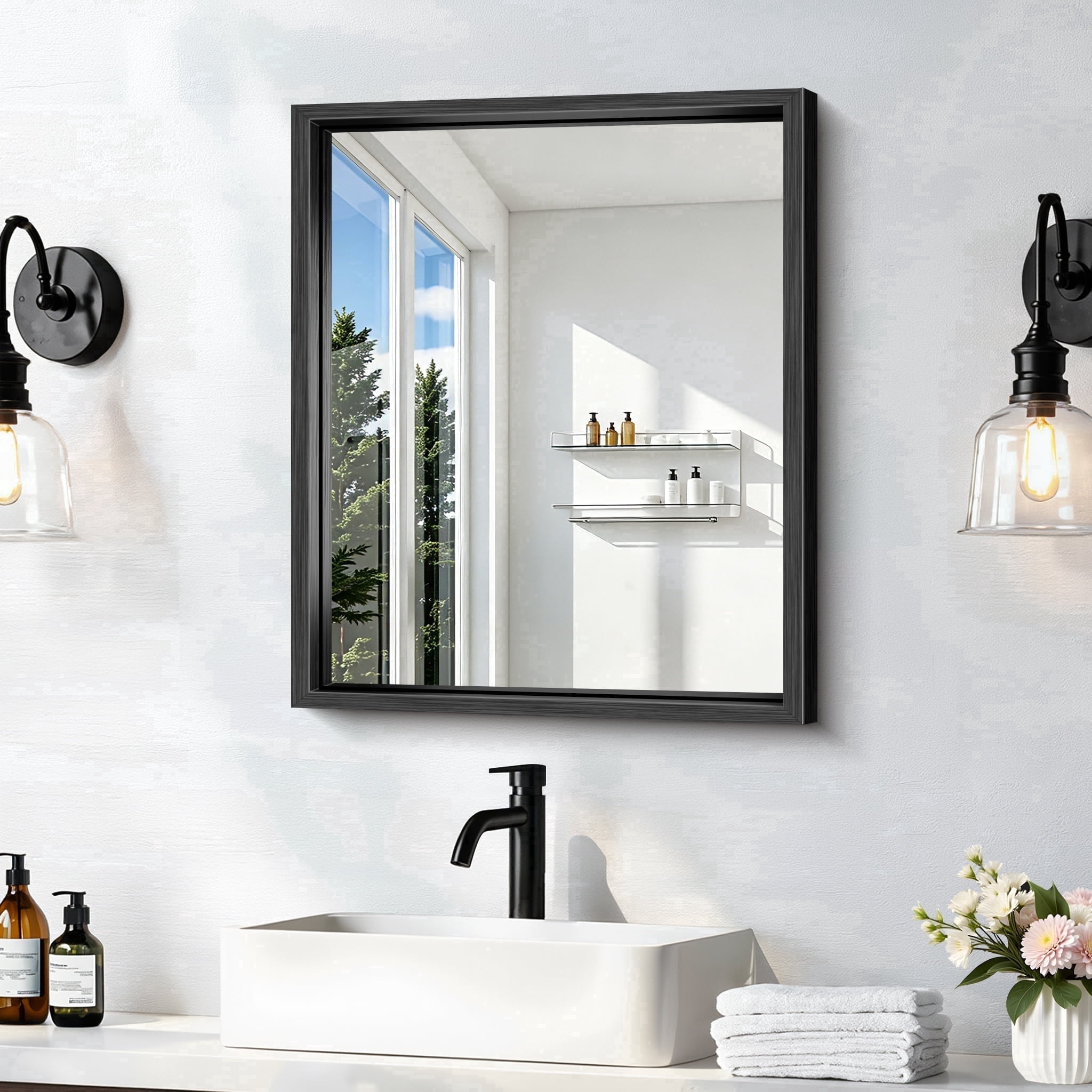 Black thickened deep-frame bathroom mirror in a styled room